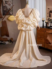 Cream Puffy Sleeve Couture Gown with Flowing Train – Luxury Bridal & Editorial Dress